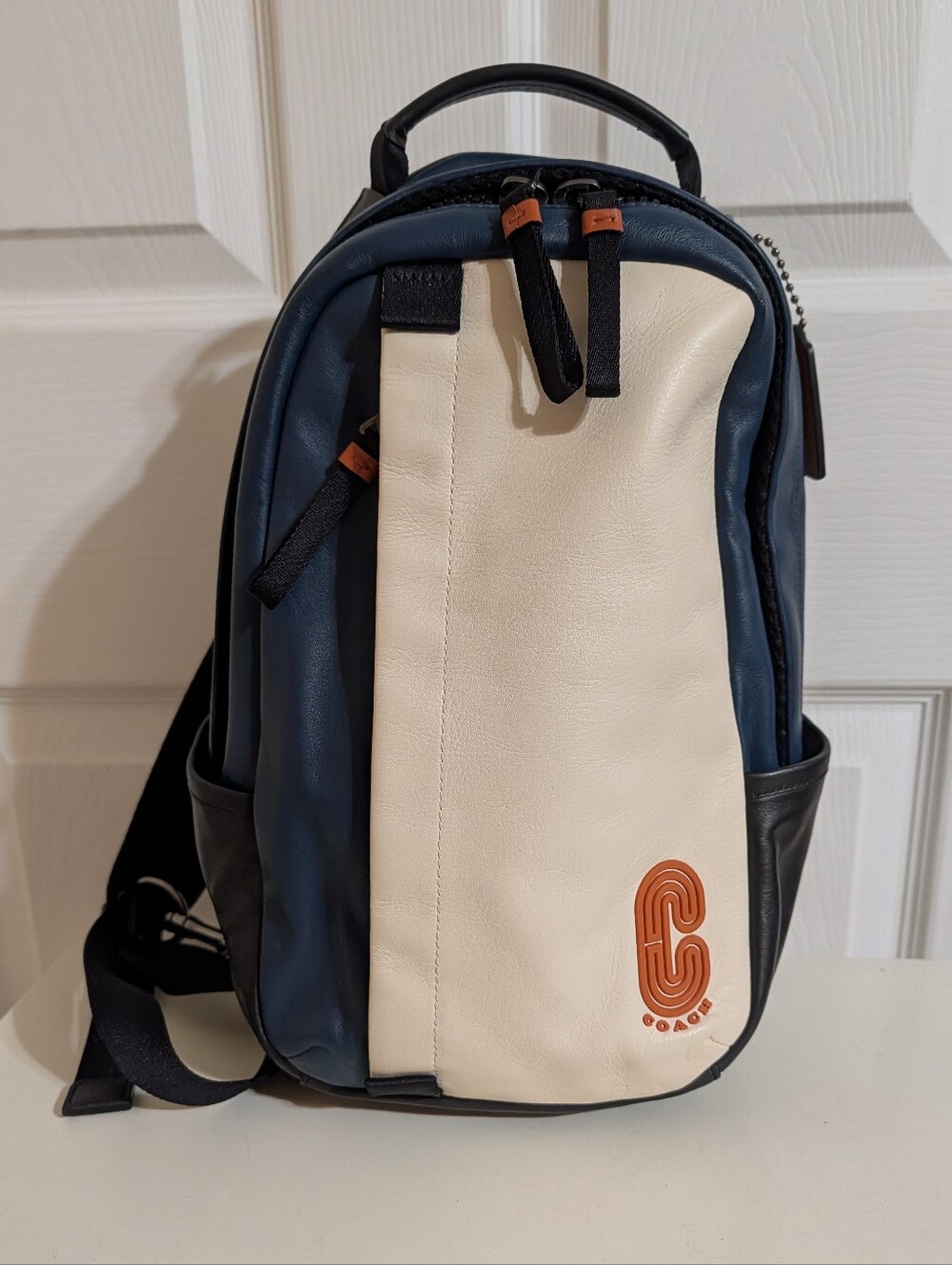 like new Coach mini backpack sling bag